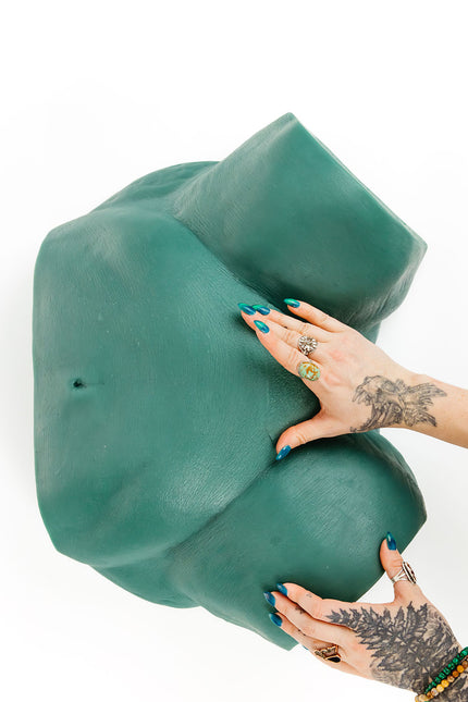 Esthetician inserting a brazilian wax anatomy key into Sayge