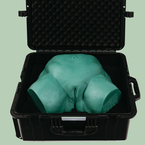 Open protective Travel Case with Sayge the wax training model inside
