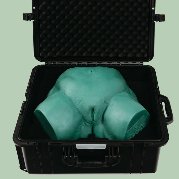 Open protective Travel Case with Sayge the wax training model inside